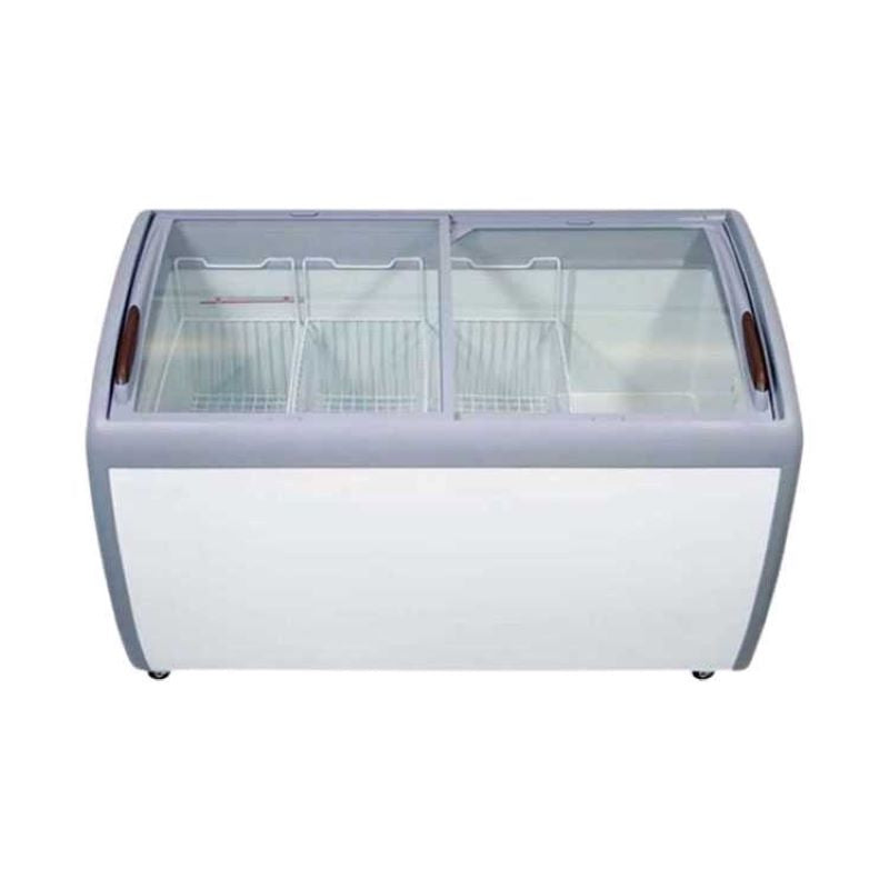 A Koolmax KMF300IC white glass lid chest freezer with multiple wire baskets inside, visible through the clear glass. The exterior is white with a grip handle and castors on the bottom of the unit.