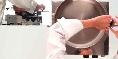 Person wearing a white chef's coat, holding a large pot over the Frucosol BC100 Cooking Machine.