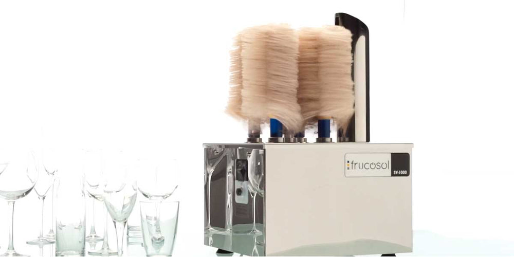 Frucosol SV1000 Glass Polisher, the unit is powered on with the polishing brushes spinning.