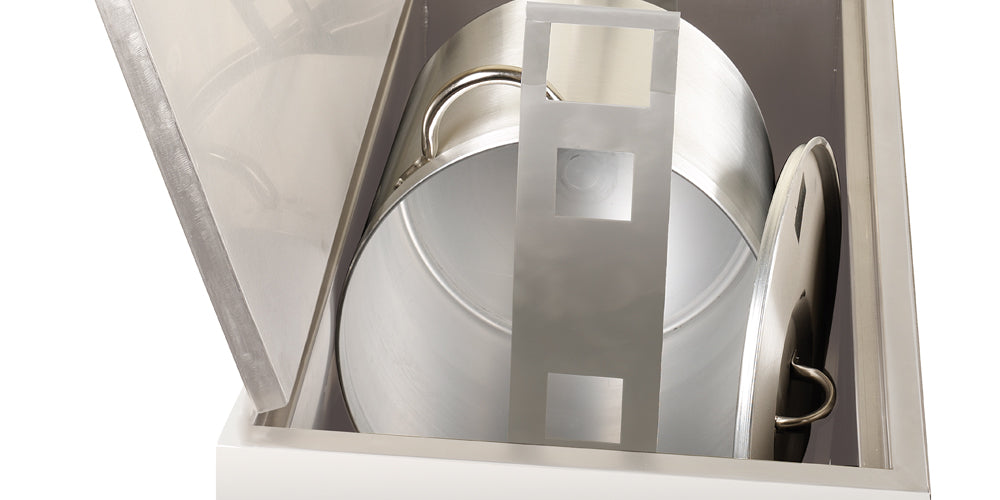 Frucosol MC1000 Decarboniser, close up view of pans sat in the internal of the unit