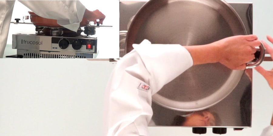 Person wearing a white chef's coat, holding a large pot over the Frucosol BC100 Cooking Machine.