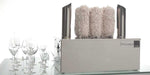 Frucosol SV2000 Glass Polisher front facing view with polished glasses to the left of the unit.
