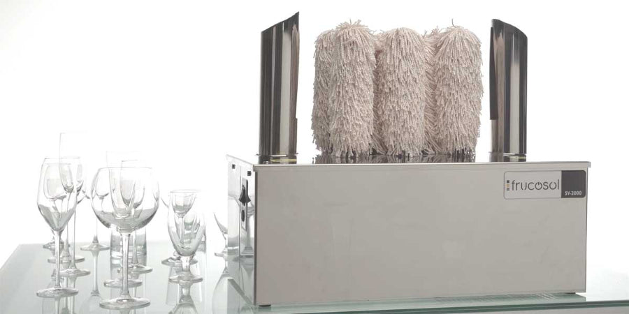 Frucosol SV2000 Glass Polisher front facing view with polished glasses to the left of the unit.